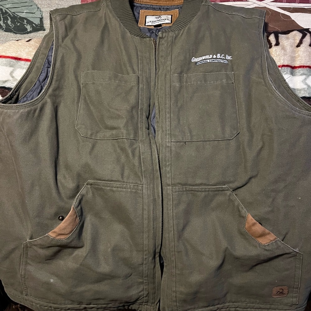 Hunter green vest. Lightly warn.